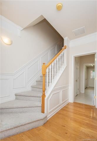 Foyer and stairs leading to second level.