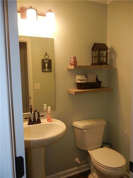 First Floor Powder Room with new flooring & fixtur