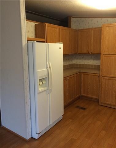 The other side of the kitchen.  All appliances rem