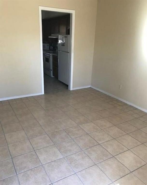 View of tiled spare room