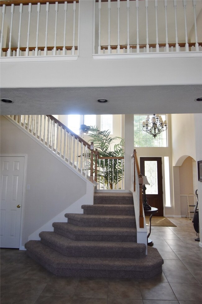 Grand Stairway Leading Up With New Carpet