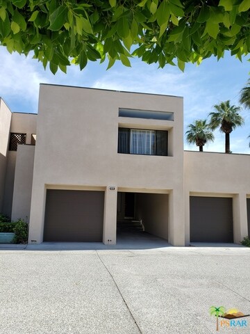 Rear Entrance - Garage & Carport