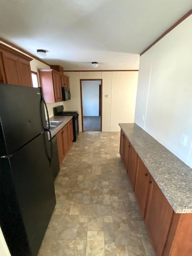 1907 Borman Ct unit 92, Milford, MI 48381 - photo 3