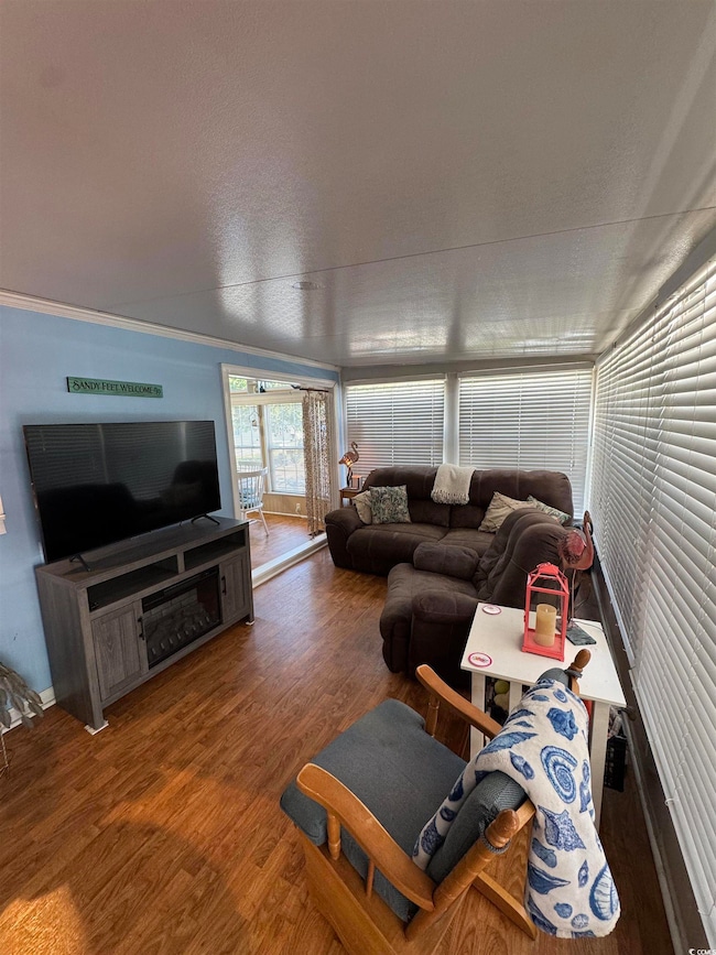 Living room with wood finished floors