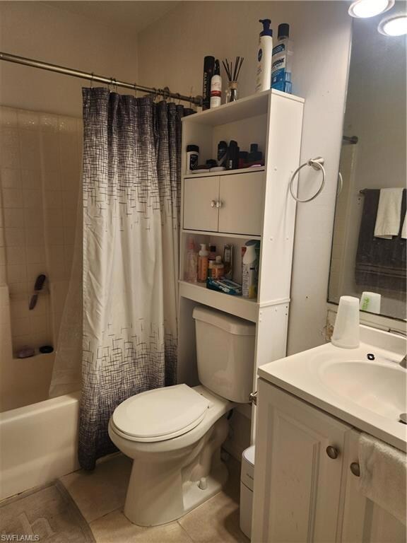 Full bathroom featuring tile floors, shower / bath