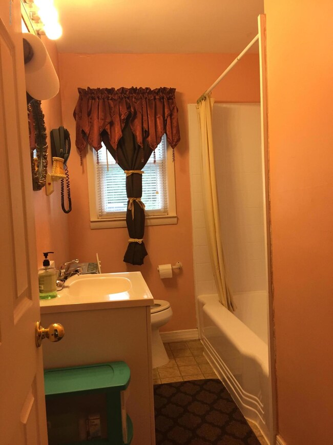 Full bath with newer tub