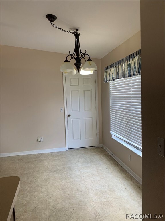 EAT IN KITCHEN WITH DOOR TO GARAGE