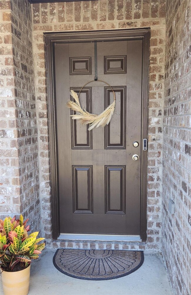 Welcoming entry with insulated door.