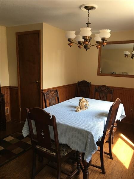 Dining room.  Powder room off dining room area.