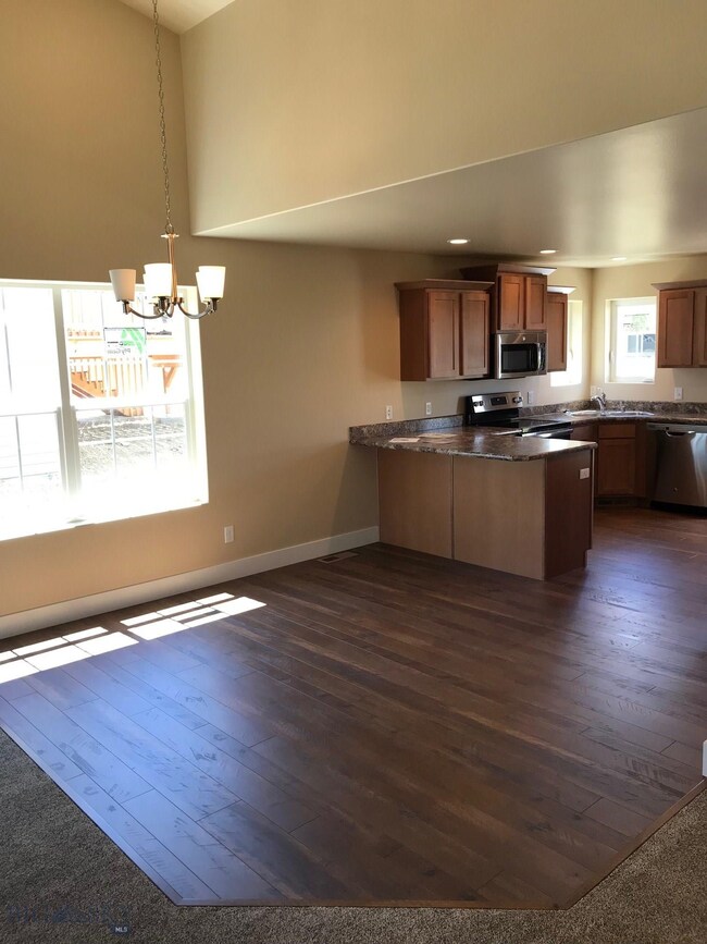 Dining room. Photo of similar home.