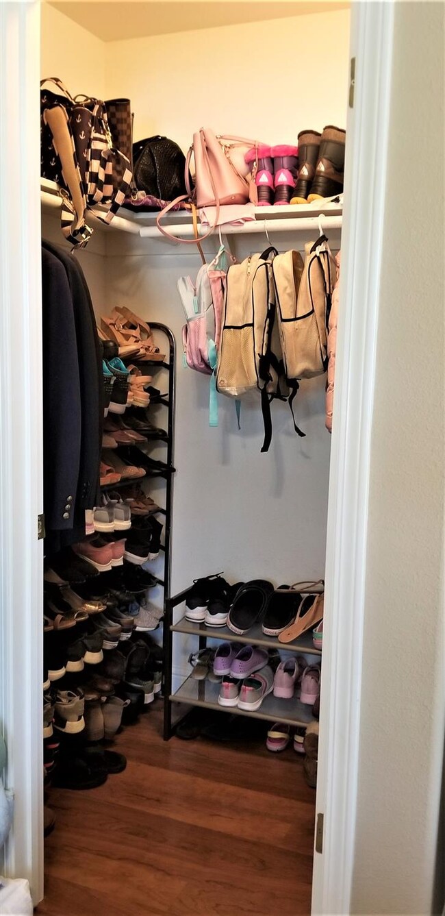 Downstairs walk in closet typical of 2nd and 3rd b