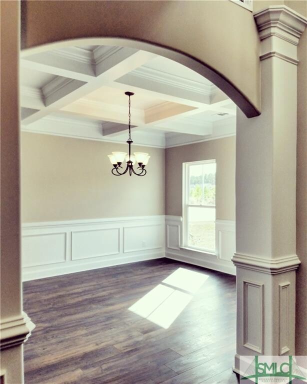 Large, open dining room with coffered ceiling.