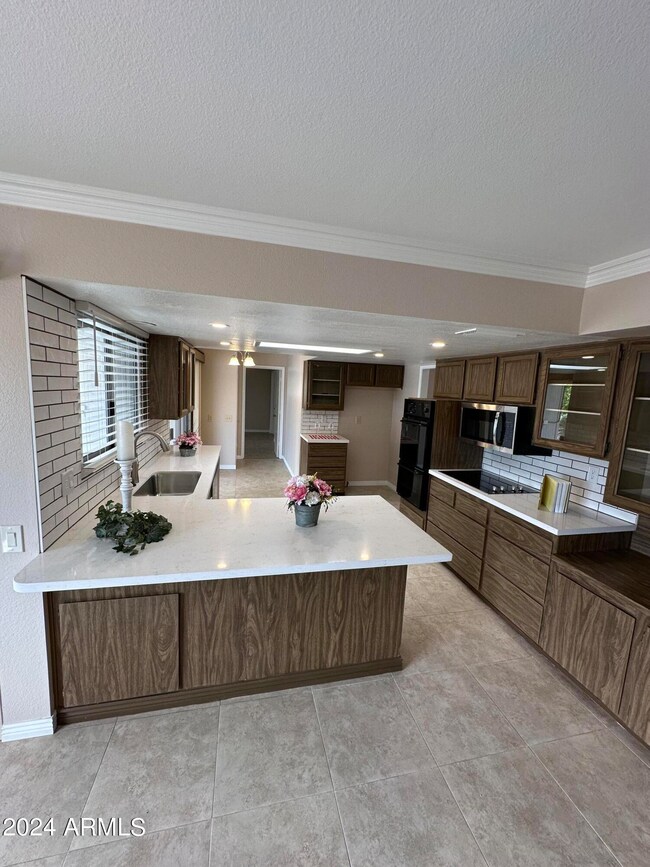 9707 W Wrangler Dr, Sun City, AZ 85373 - photo 5