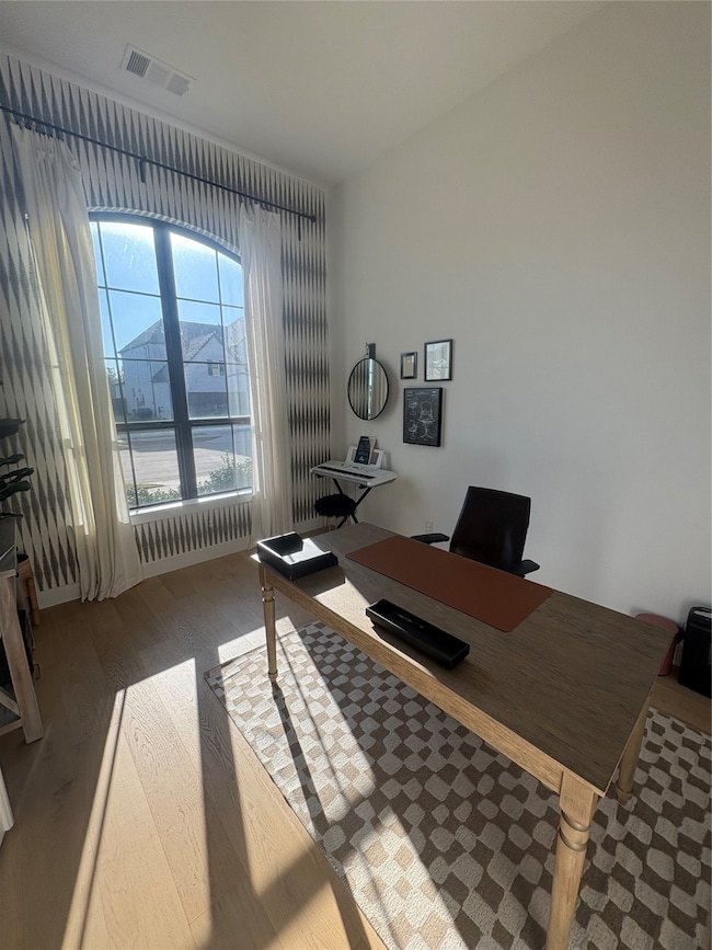 Office space featuring wood finished floors