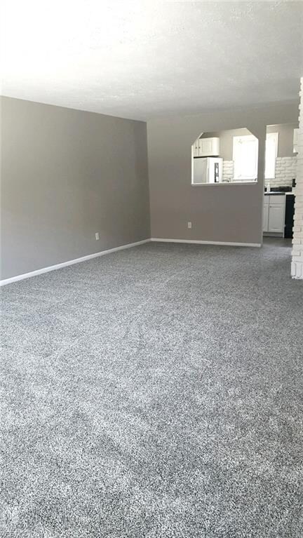 Large Open living Room with fresh paint & new carp