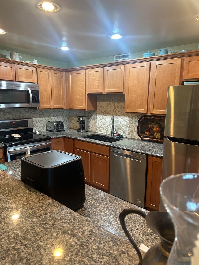Kitchen is open to living/dining room