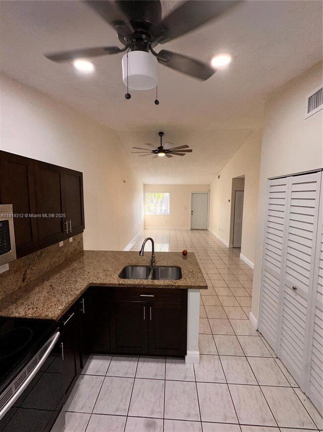7191 W 24th Ave unit 5PH8, Hialeah, FL 33016 - photo 7