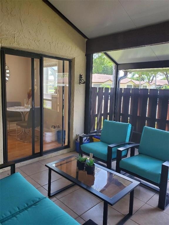 YOU CAN ACCESS THIS OUTDOOR LIVING SPACE FROM THE