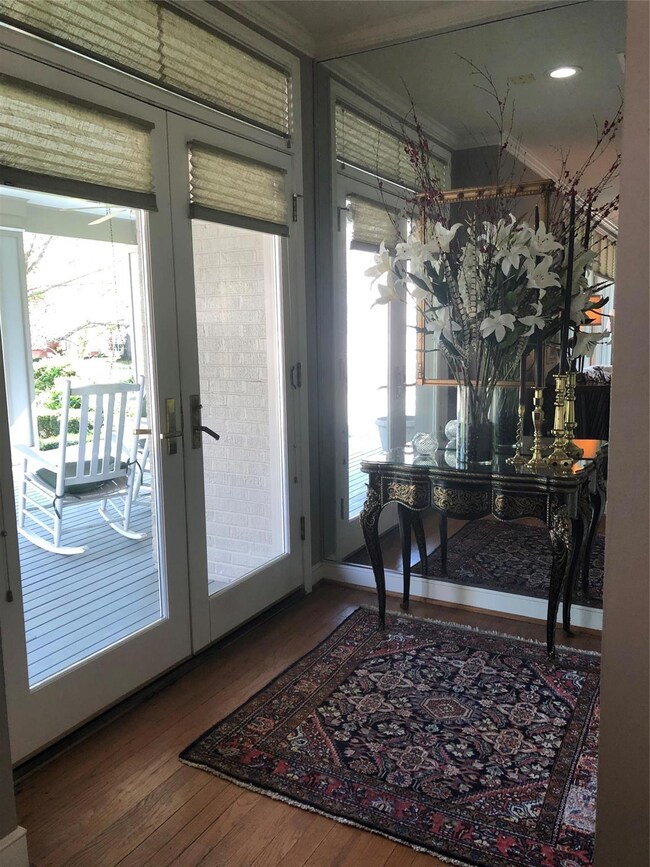 Doorway featuring french doors and dark hardwood /