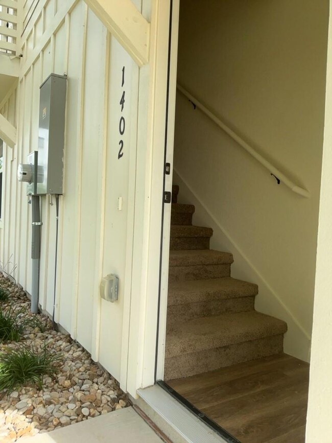 View of stairs leading up to unit