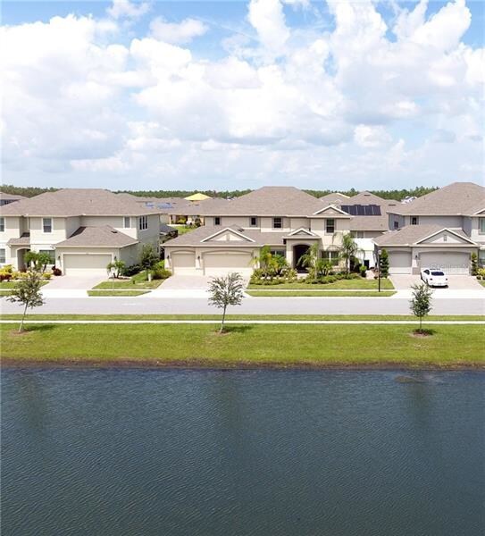 Front Exterior Shot over Front Pond.
