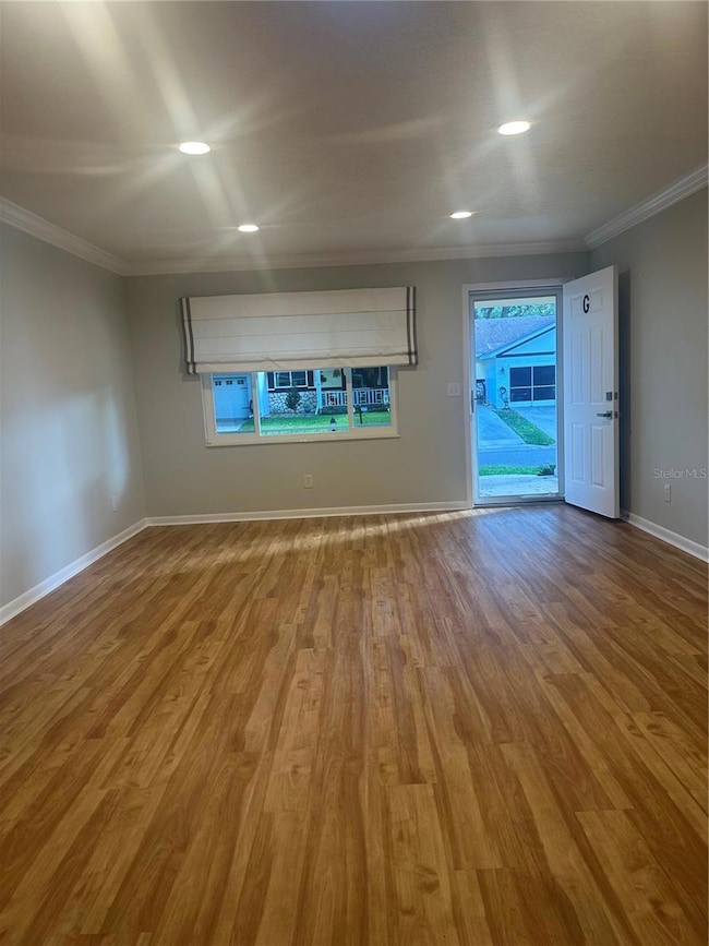 From back of Living Room looking to front door.