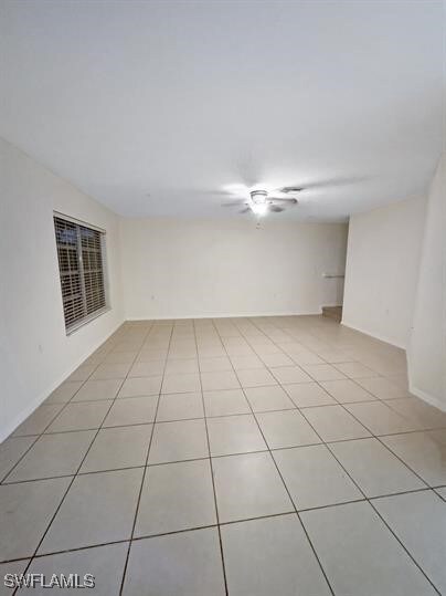 Spare room with light tile patterned floors