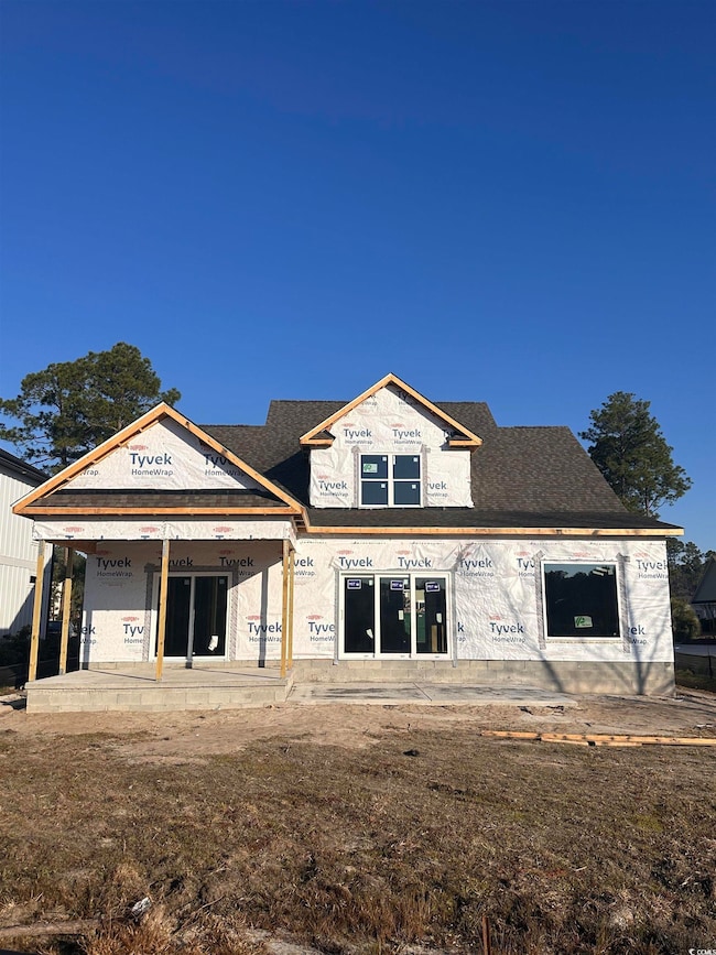Property in mid-construction with roof with shingl