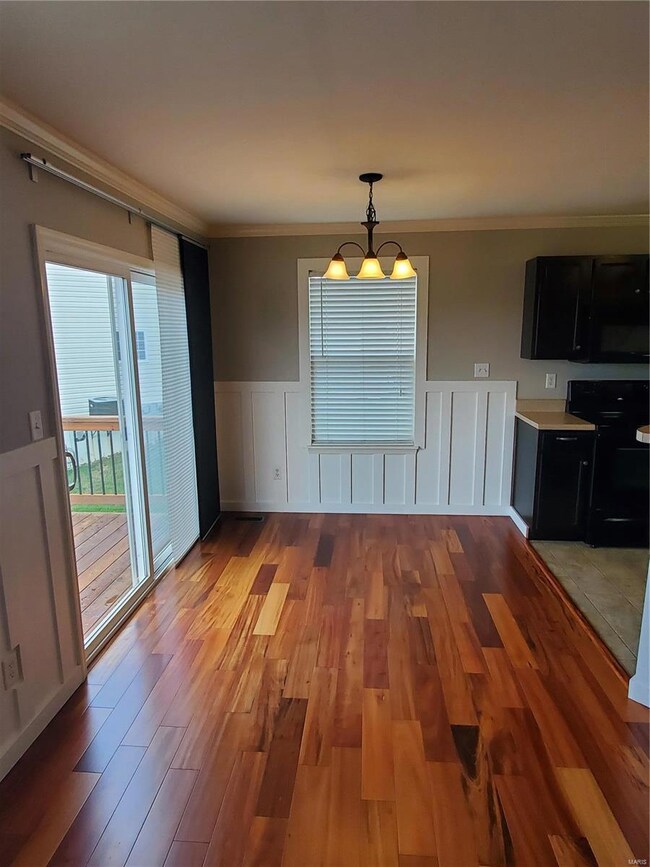 Breakfast room with sliding glass door to the back deck.