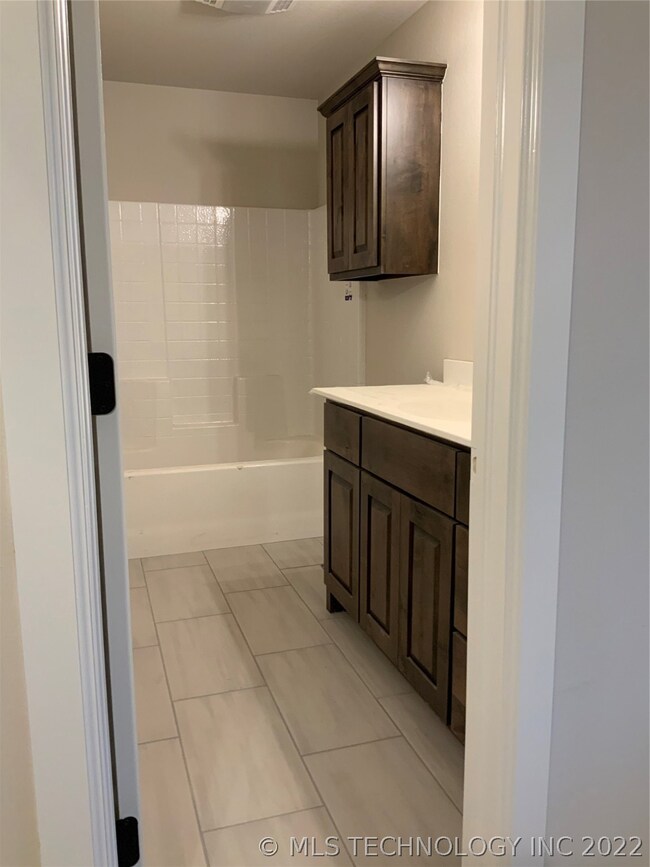 Pullman bathroom connects 2 downstairs spare bedro