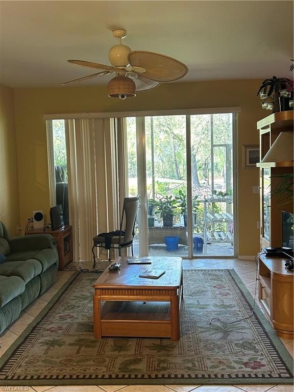 Living room featuring tile patterned flooring and 