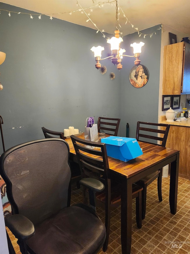 Dining room featuring a chandelier