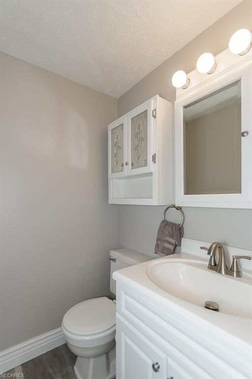 Half bath with new sink and faucet.