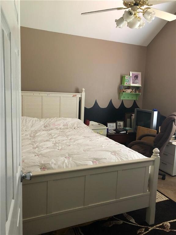 One of four bedrooms, has vaulted ceilings
