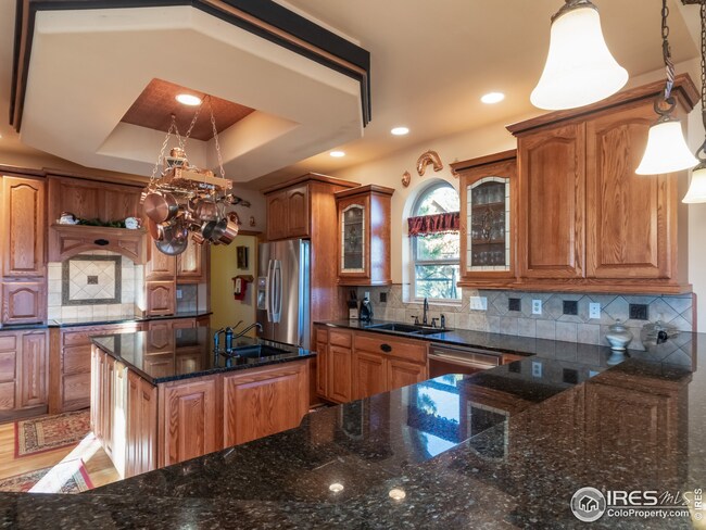 Kitchen of granite and stainless