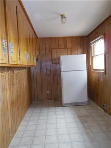 Utility room has built in cabinets and is spacious