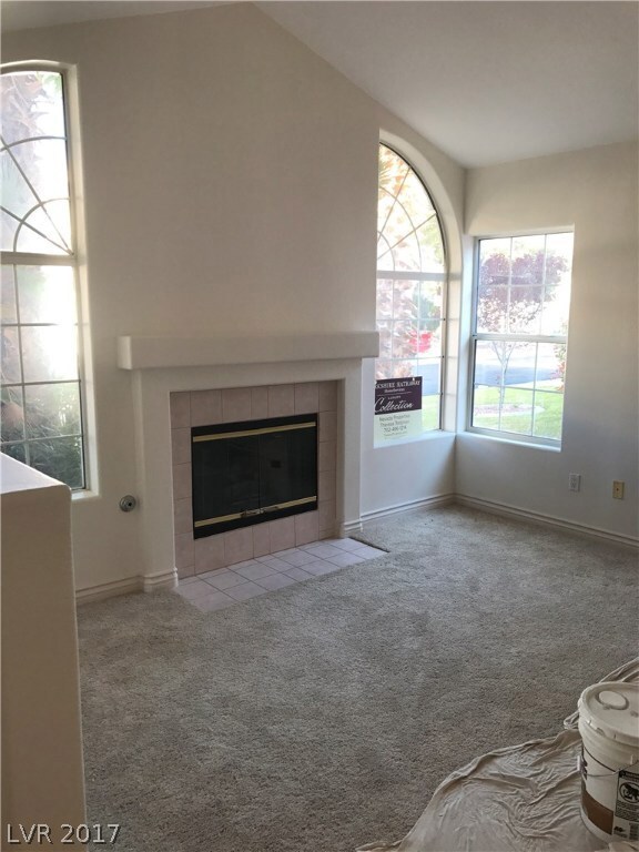 Living Room with Fireplace, new flooring entire ho
