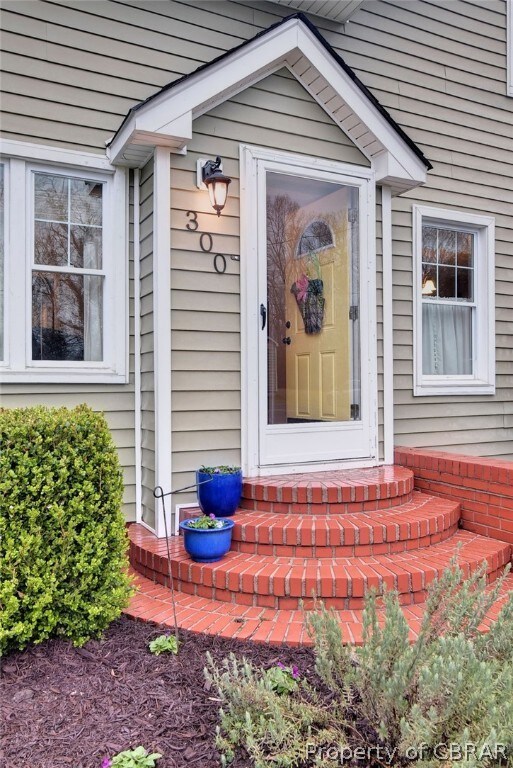 Welcome home!  Front door for all seasons. Brick p