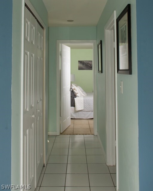 Hallway With Laundry Closet and Guest Bath