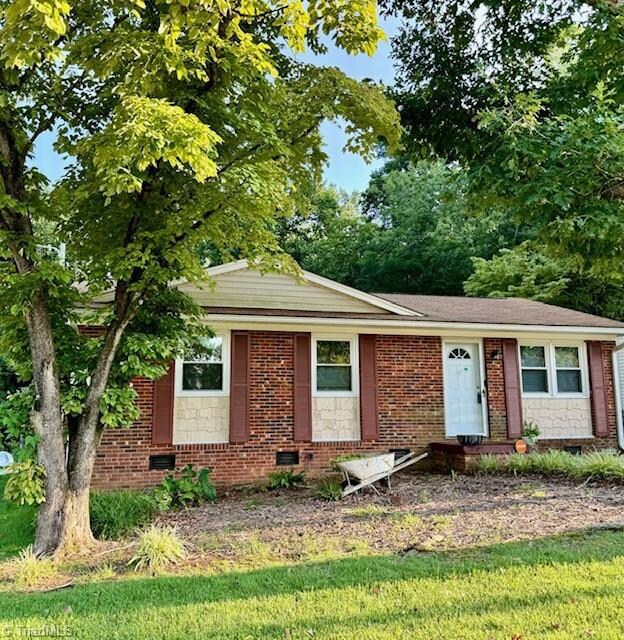 Low maintenance vinyl and brick.