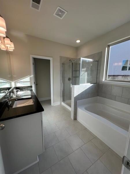 Bathroom featuring vanity, independent shower and 