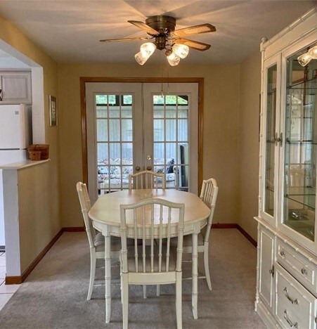 The Dining area has french doors which open to the