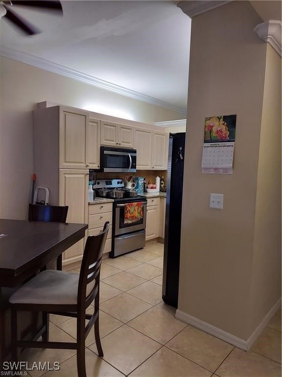 Kitchen featuring appliances with stainless steel