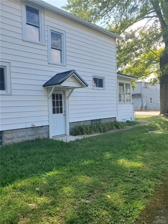 Side entrance with 2nd driveway