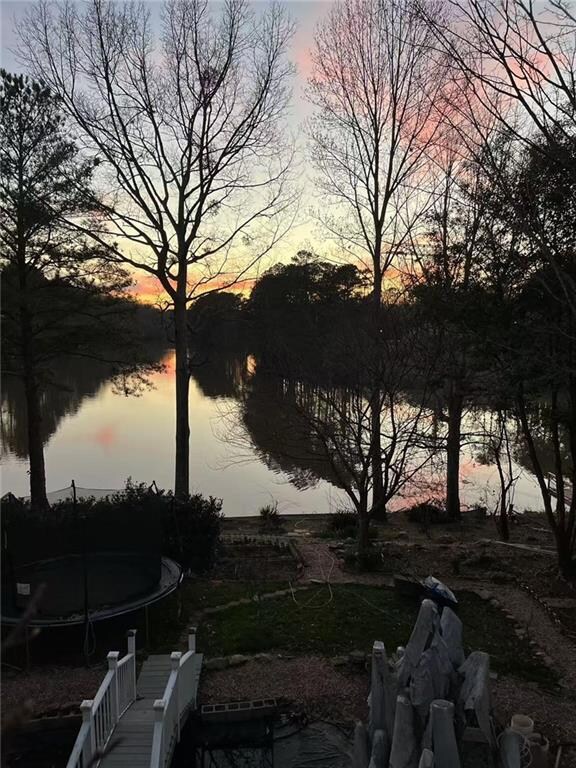 View of community with a water view