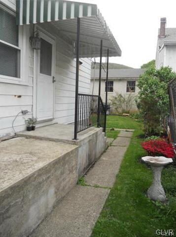 The side of the home leading to the back door and 
