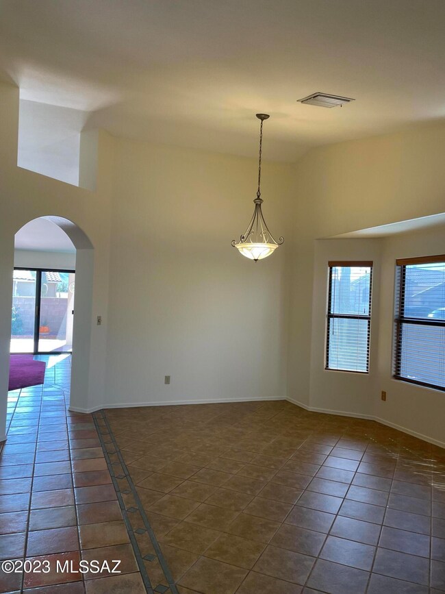 Living  and dining room with bay window