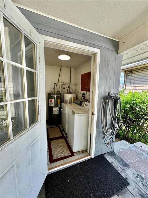 Laundry room with access from back patio