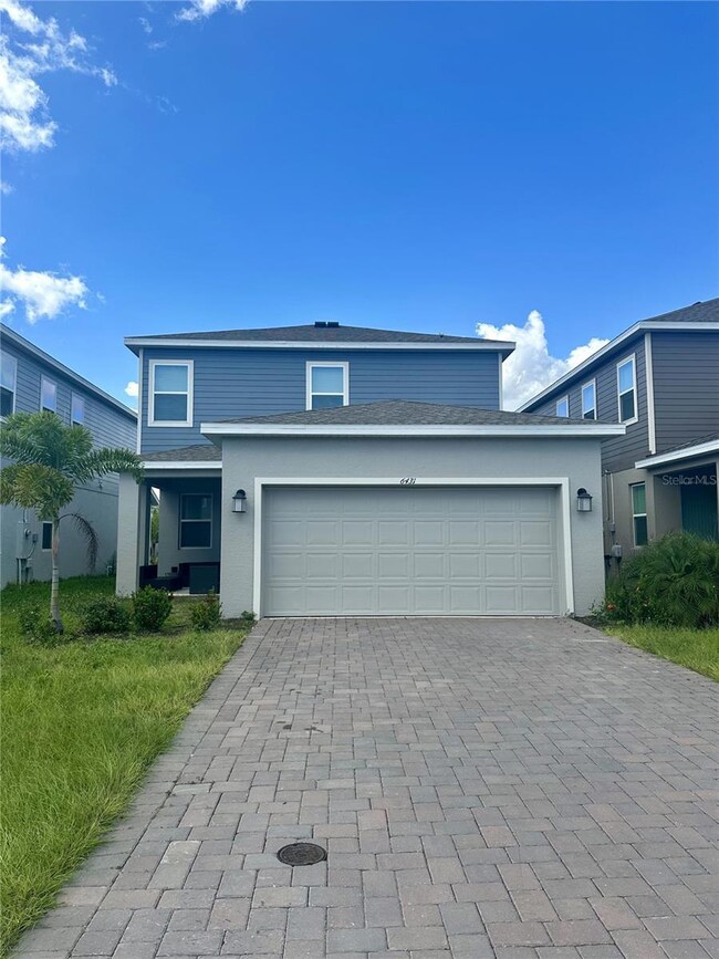 6431 Pine Fork Aly, Saint Cloud, FL 34771 - photo 2