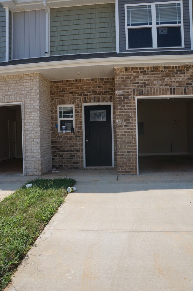 Front door entryway is at ground level.